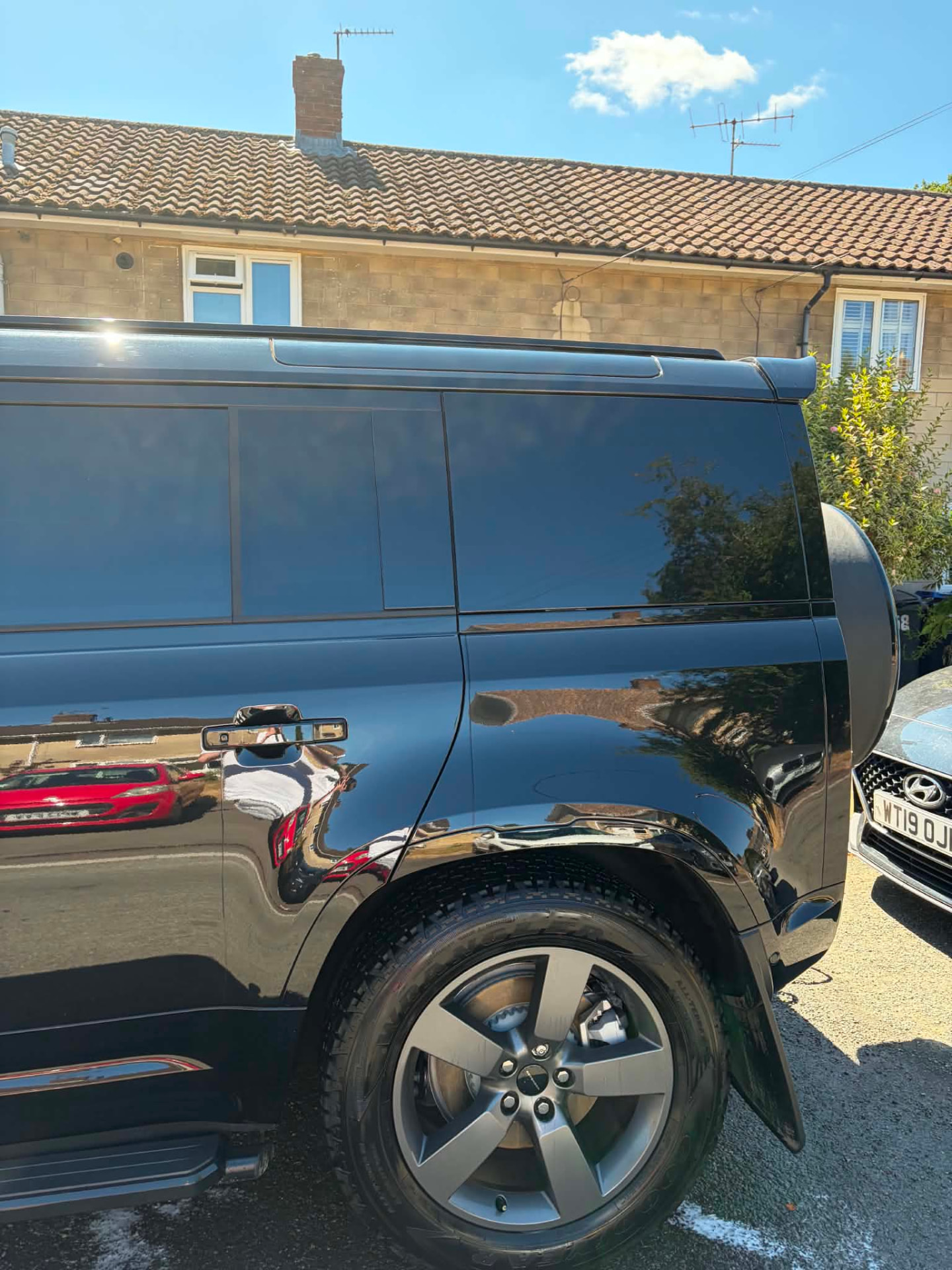 Freshly valeted black Land Rover Defender in Wiltshire